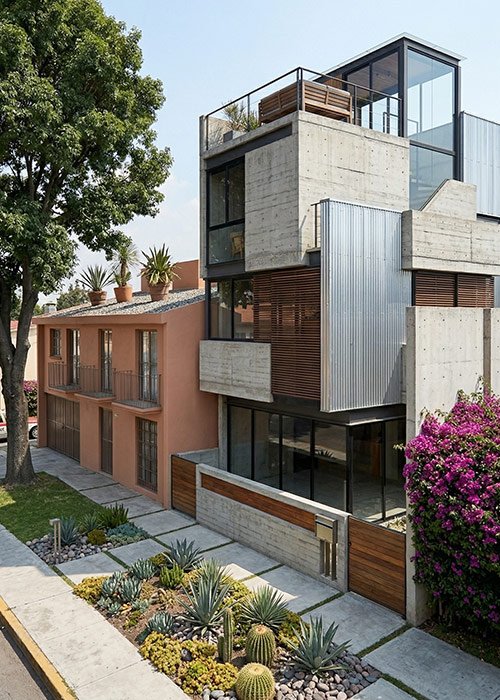 Fachada de casa remodelada con diseño moderno